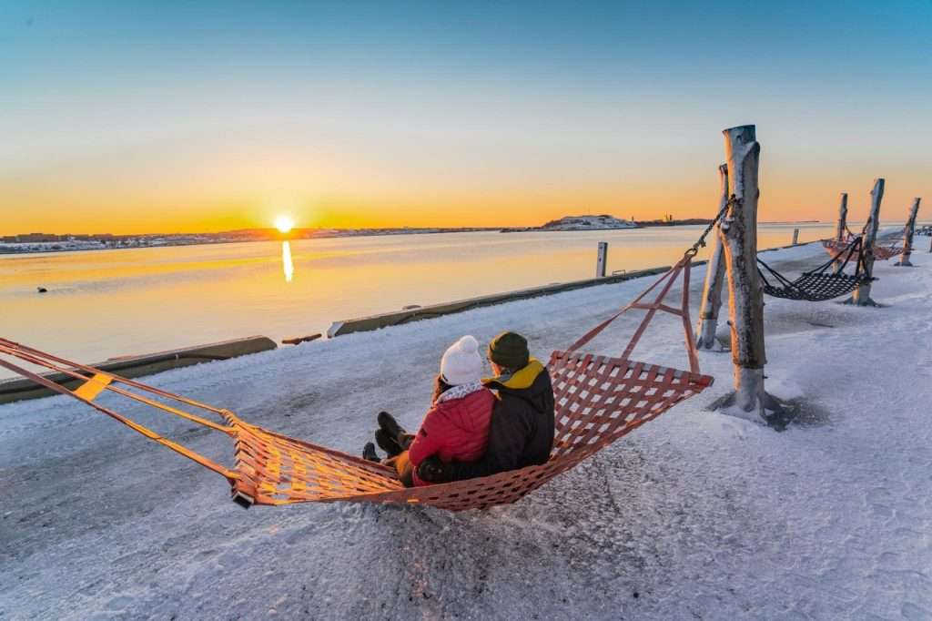 A couple catching a beautiful sunset in late October.