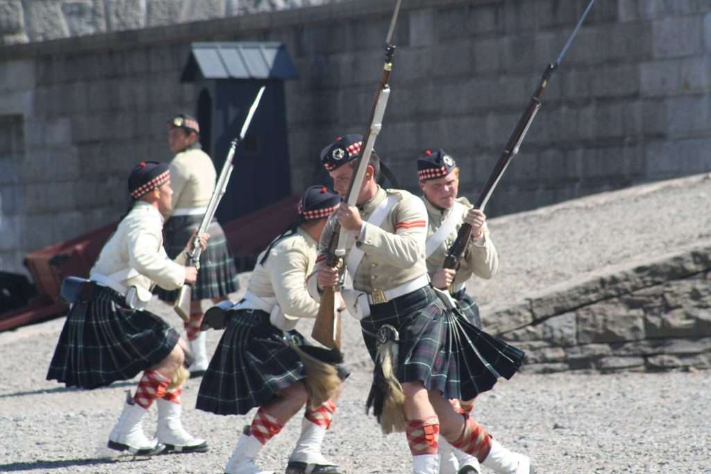 Halifax Citadel Highlanders in uniform drill demonstration.