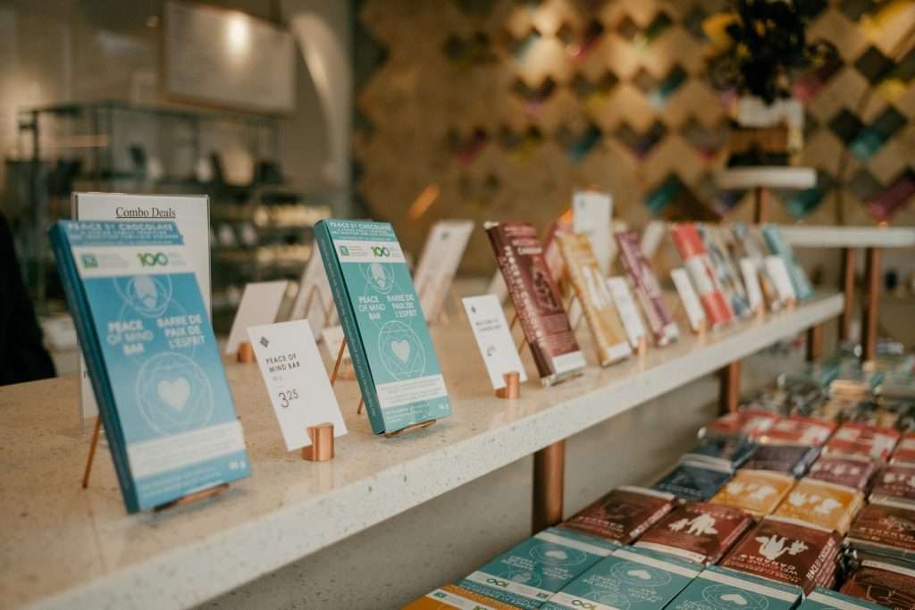 Book stand with novels by Prince Edward Island and New Brunswick authors.