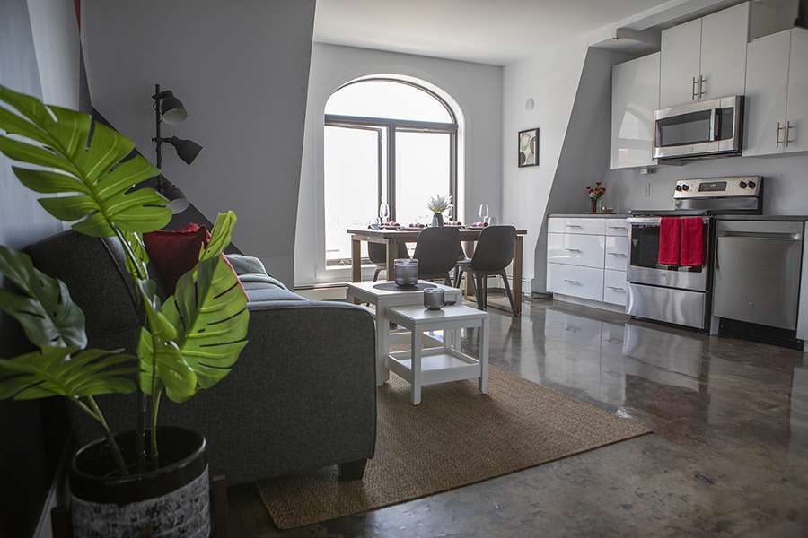 Open-plan Cameo suite with a kitchen and living area for guests who prefer a downtown Halifax staycation.