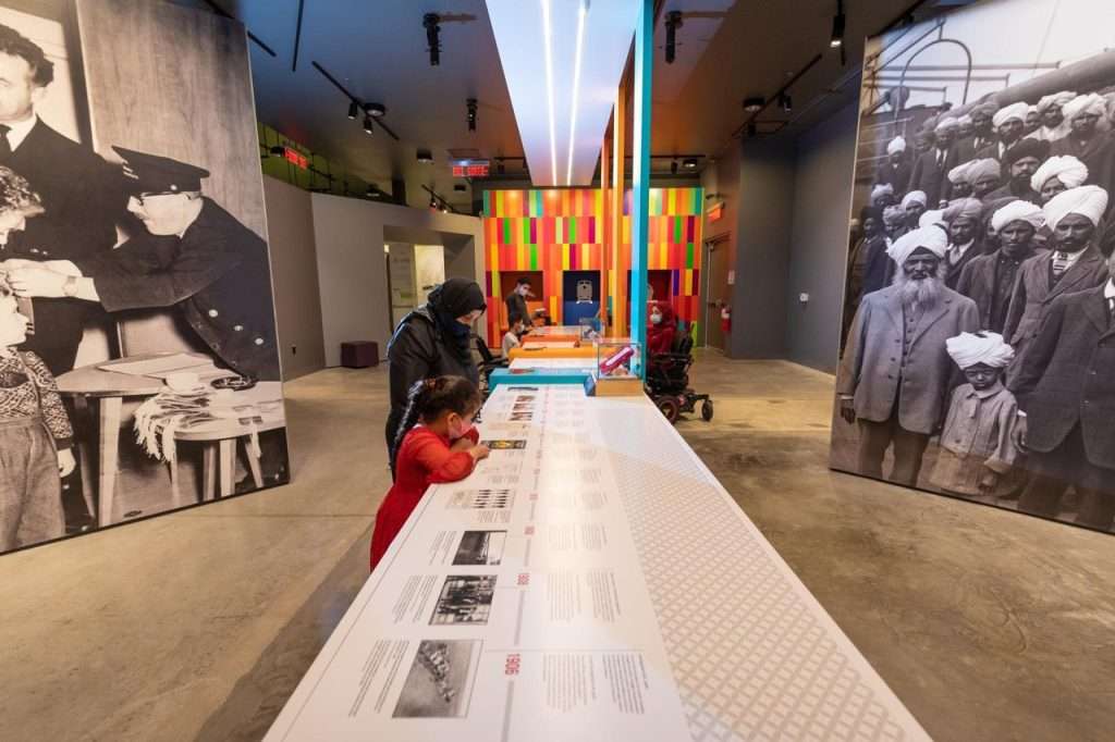 anadian Museum of Immigration at Pier 21 exhibit hall with visitors
